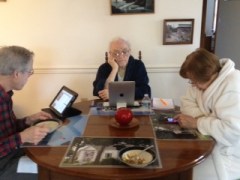 Mom, Dad, and my husband, getting our technology fix during an early morning breakfast.